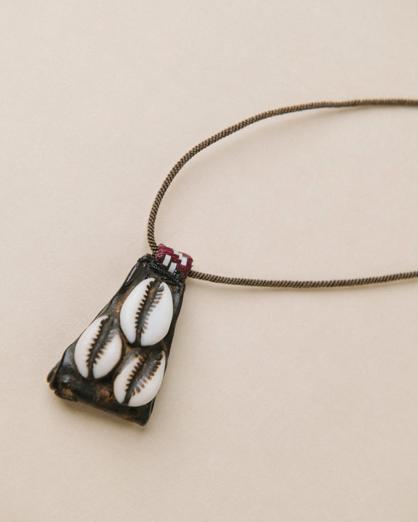 Heirloom Leather and Cowrie Shell Amulet
